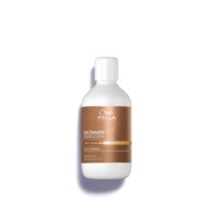 100ML WELLA PROFESSIONALS ULTIMATE SMOOTH Shampoing nourrissant pour cheveux secs, ternes ou frisés  1 of 2 