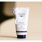 150ml CHRISTOPHE ROBIN NUIT Crème de nuit réparatrice à la fleur de lotus blanche ? 2 of 3 Crème de nuit réparatrice à la fleur de lotus blanche ?