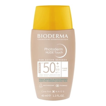 Fluide spf50+ teinté clair, effet peau nue - peaux sensibles mixtes à grasses