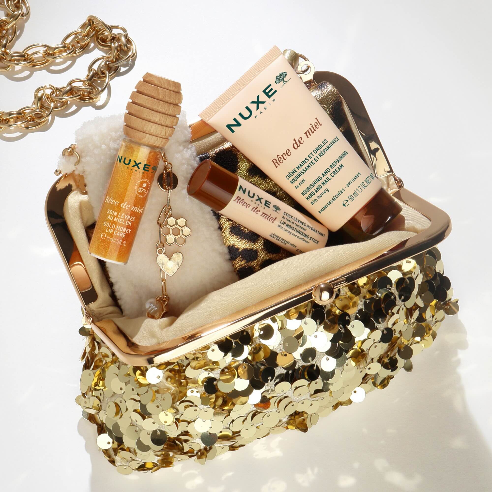 10ML Nuxe RÊVE DE MIEL Soin lèvres au miel or avec étui & charms 1 of 4