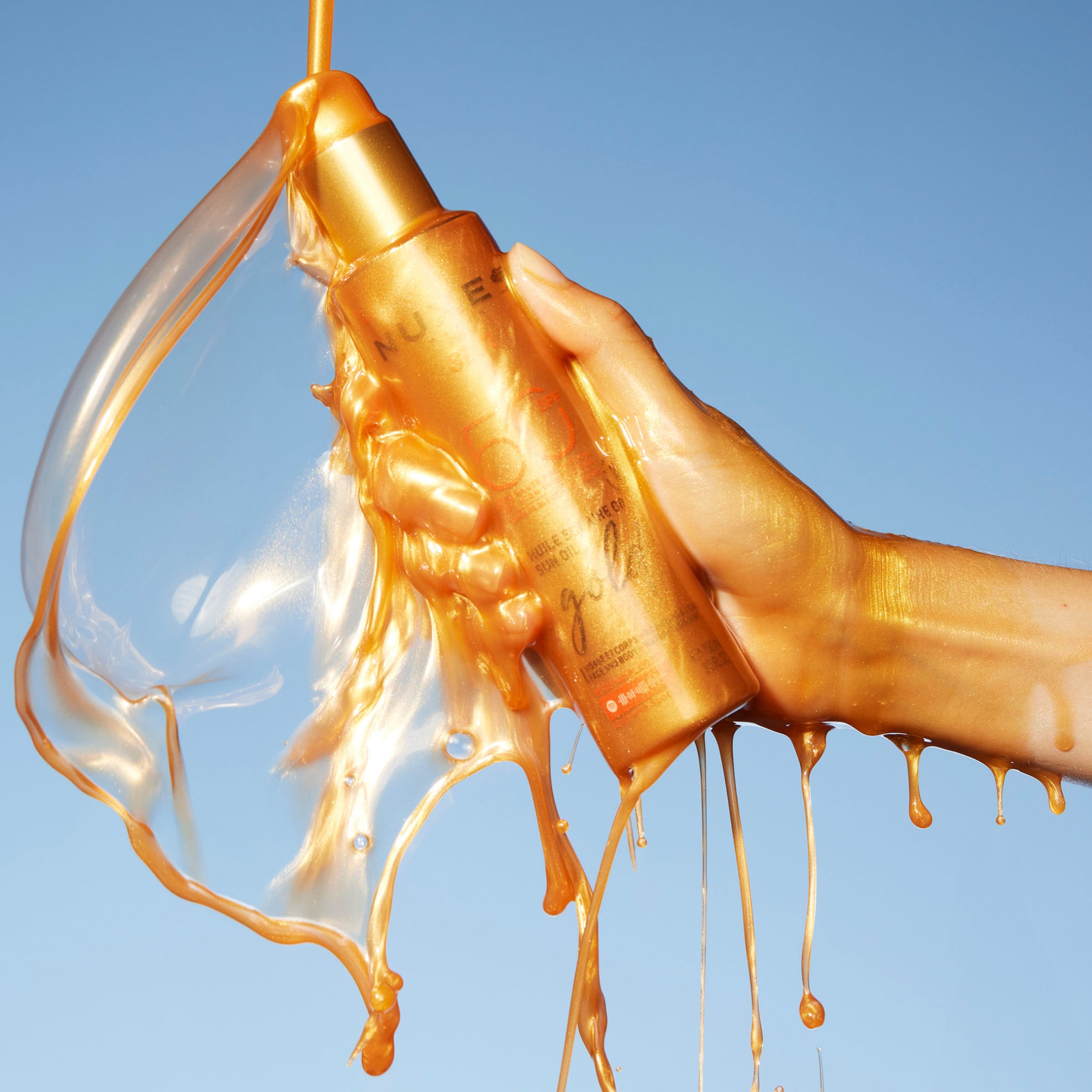 Huile solaire or spf50