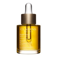 30mL Clarins HUILE VISAGE Huile santal - peaux sèches ou rosées  