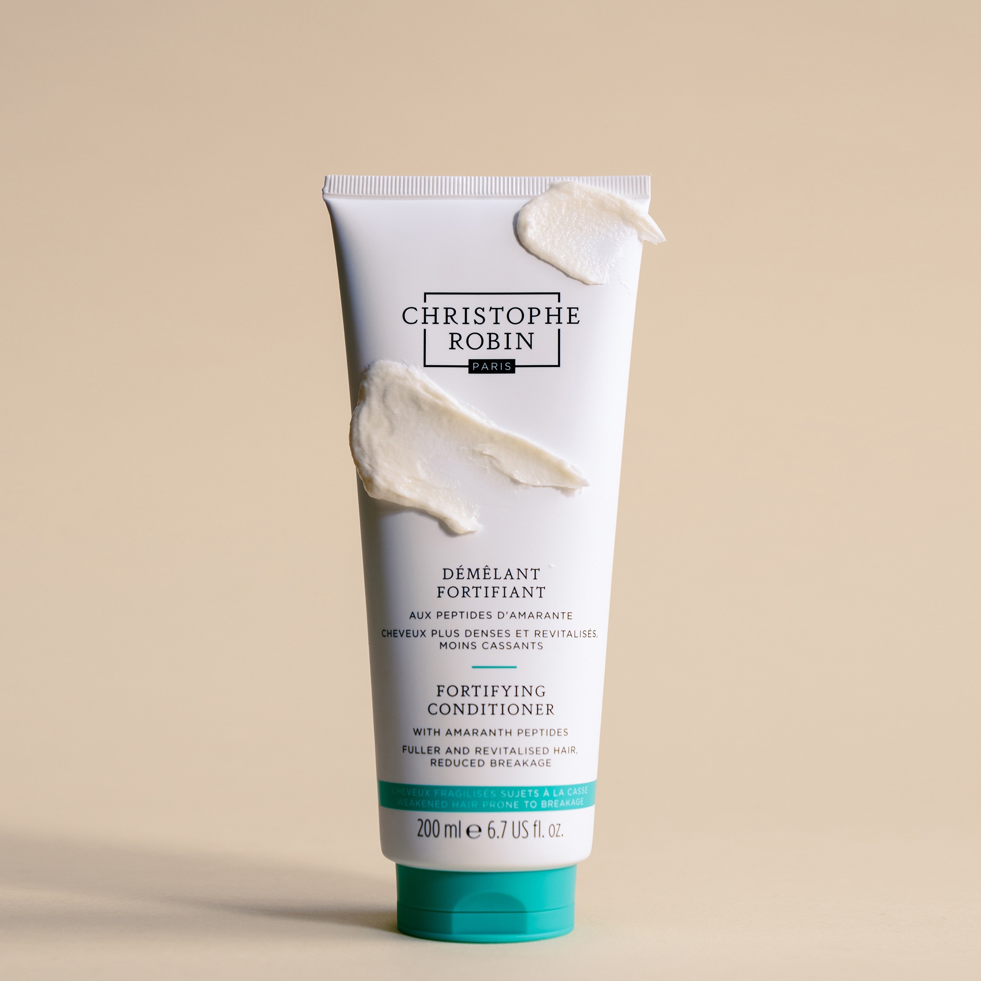 Démêlant fortifiant aux peptides d'amarante